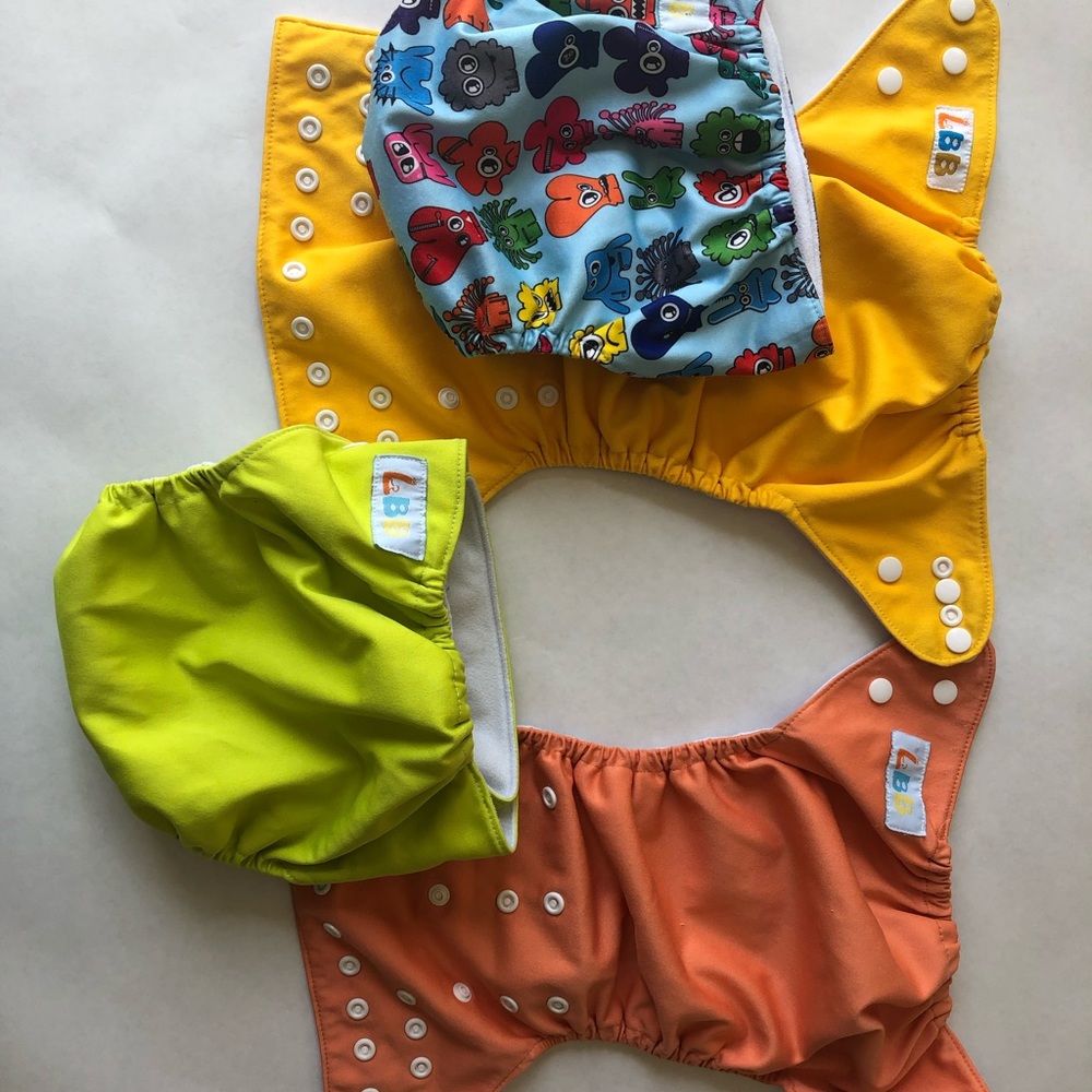 Sixteen (16) LBB cloth diaper covers